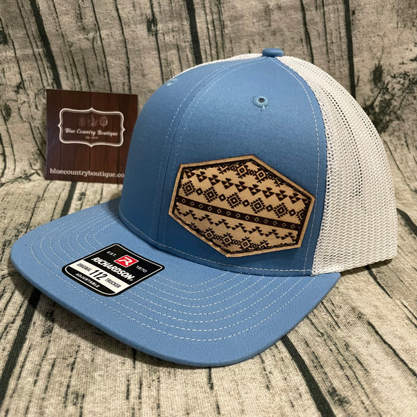 blue/white aztec line design leather patch trucker hat