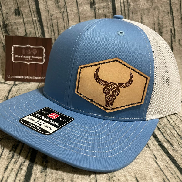 blue/white trucker cap with custom leather patch aztec cow