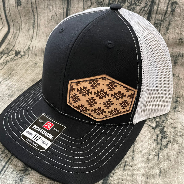 black/white trucker cap with aztec leather patch
